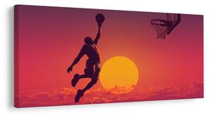 Obraz basketbalista pri západe slnka
