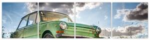 Obraz zeleného auta v tráve (Obraz 160x40cm)