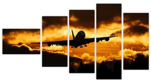 Pristávajúce lietadlo pri západe slnka - obraz (Obraz 110x60cm)