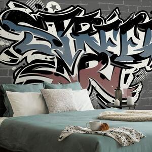 Tapeta s tehlovou imitáciou a nápisom Street Art