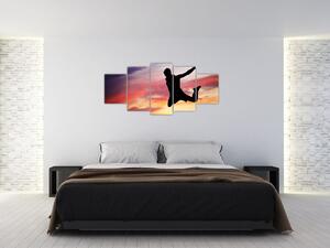 Obraz skákajúceho muža (Obraz 150x70cm)