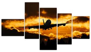 Pristávajúce lietadlo pri západe slnka - obraz (Obraz 150x85cm)