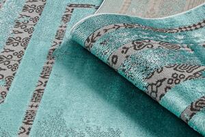 Moderný koberec DE LUXE 1516 Rám vintage - Štrukturálny zelený / antracit
