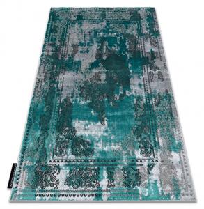 Moderný koberec DE LUXE 6827 Abstrakcia, vintage - Štrukturálny zeleno / sivý