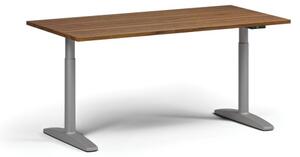 Výškovo nastaviteľný stôl OBOL, elektrický, 675-1325 mm, doska 1600x800 mm, sivá zaoblená podnož, orech