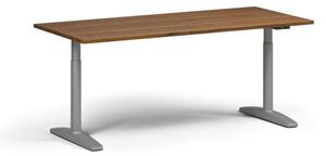 Výškovo nastaviteľný stôl OBOL, elektrický, 675-1325 mm, doska 1800x800 mm, sivá zaoblená podnož, orech