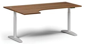 Výškovo nastaviteľný stôl OBOL, elektrický, 675-1325 mm, rohový ľavý, doska 1800x1200 mm, biela zaoblená podnož, orech