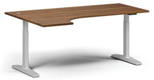 Výškovo nastaviteľný stôl, elektrický, 675-1325 mm, rohový ľavý, doska 1800x1200 mm, biela podnož, orech