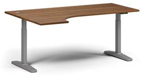 Výškovo nastaviteľný stôl, elektrický, 675-1325 mm, rohový ľavý, doska 1800x1200 mm, sivá podnož, orech