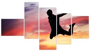 Obraz skákajúceho muža (Obraz 150x85cm)