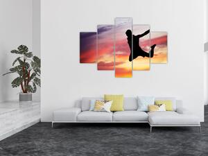 Obraz skákajúceho muža (Obraz 150x105cm)