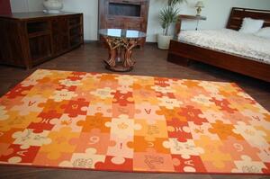 Dywany Lusczow Detský koberec PUZZLE oranžový