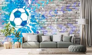 Samolepiaca tapeta modrá futbalová lopta na tehlovej stene