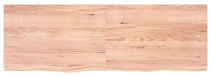 Nástenná polica bledohnedá 180x60x(2-6) cm ošetrený masívny dub