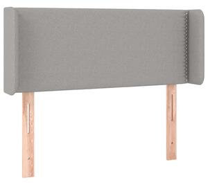 Čelo postele s LED bledosivé 103x16x78/88 cm látka