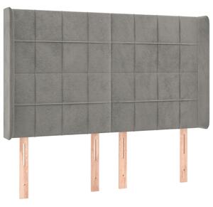 Čelo postele s LED bledosivé 147x16x118/128 cm zamat