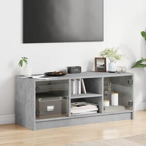 TV skrinka so sklenenými dvierkami betónovo sivá 102x37x42 cm