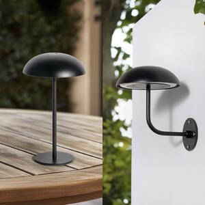 Nabíjateľná stolová lampa Arcchio LED Thenra, čierna, nástenný držiak