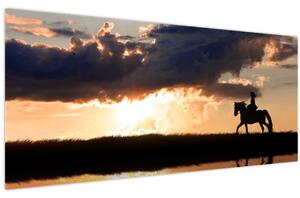 Obraz - Jazdec na koni pri západe slnka (120x50 cm)