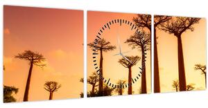 Obraz - Západ slnka v uličke Baobab (s hodinami) (90x30 cm)