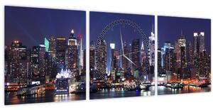 Obraz - Osvetlené New Yorské mrakodrapy (s hodinami) (90x30 cm)