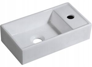 Obdĺžnikové keramické umývadlo biele na doske 40x22 cm