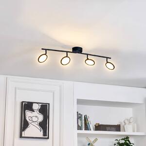 Lindby LED reflektor Manel, čierny, železný, dĺžka 82 cm, 4.flg