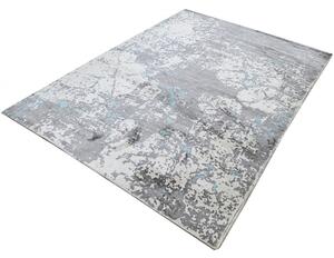 Modrý prskaný koberec s abstraktným motívom - moderný ligotavý koberec 1,70 x 2,40 m