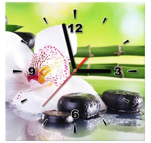 Obraz s hodinami Biela orchidea a kamene Rozmery: 100 x 40 cm