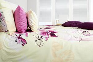 Glamonde luxusné obliečky Ornella , ktorých krémovožltý podklad je doplnený fialovými Orchideami. 140×200 cm