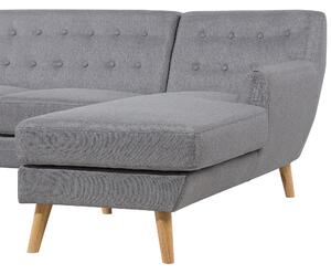 Rohová pohovka svetlosivá čalúnená všívaná zadná strana silne polstrovaná leňoška Ľahké drevené nohy Škandinávska minimalistická obývačka