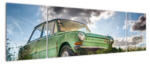 Obraz zeleného auta v tráve (Obraz 170x50cm)