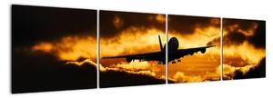 Pristávajúce lietadlo pri západe slnka - obraz (Obraz 160x40cm)