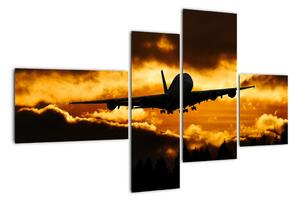 Pristávajúce lietadlo pri západe slnka - obraz (Obraz 110x70cm)