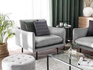 Kreslo sivé zamatové na čiernych nohách minimalistická retro obývacia izba