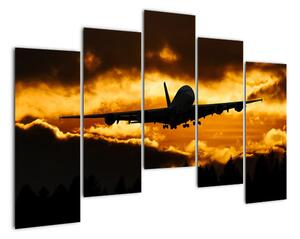 Pristávajúce lietadlo pri západe slnka - obraz (Obraz 125x90cm)