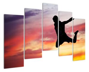 Obraz skákajúceho muža (Obraz 125x90cm)