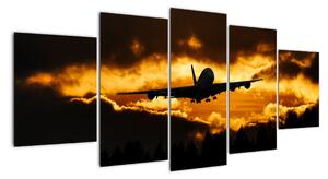 Pristávajúce lietadlo pri západe slnka - obraz (Obraz 150x70cm)