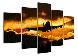 Pristávajúce lietadlo pri západe slnka - obraz (Obraz 150x105cm)