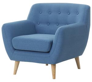 Kreslo modré prešívané operadlo nohy zo svetlého dreva hrubo vystužené obývacia izba