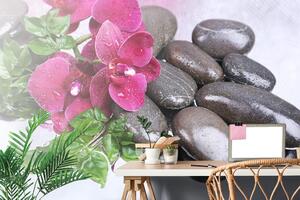 Fototapeta kvitnúca orchidea a wellness kamene