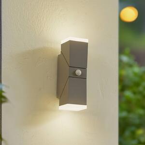 Lindby LED nástenné svietidlo Sally, 22 cm, sivé, IP54, senzor