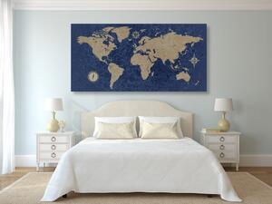 Obraz na korku mapa sveta s kompasom v retro štýle na modrom pozadí