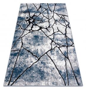 Moderný koberec COZY 8873 Cracks, prasknutý betón, modrý