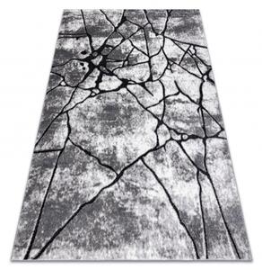Moderný koberec COZY 8873 Cracks, prasknutý betón, tmavosivý