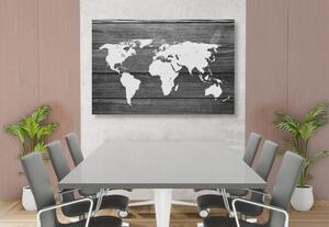 Obraz čiernobiela mapa sveta s dreveným pozadím