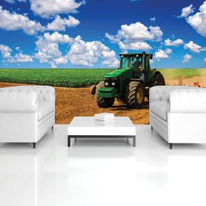 Fototapeta - Zelený traktor na ihrisku (152,5x104 cm)