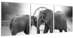 Obraz - čiernobiele slony (s hodinami) (90x30 cm)