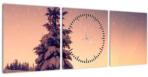 Obraz zasneženého stromu na lúke (s hodinami) (90x30 cm)
