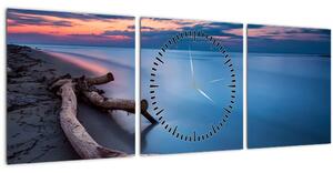 Obraz pláže pri západe slnka (s hodinami) (90x30 cm)